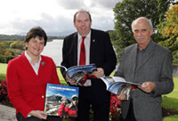 Minister Foster, Director Garth Earls and Author Paul Lyle launch the new GSNI publication Between Rocks and Hard Places Minister Foster, Director Garth Earls and Author Paul Lyle launch the new GSNI publication Between Rocks and Hard Places